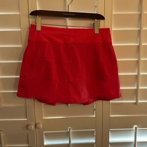 Lululemon Athletica Vivid Pink athletic skirt w/built in shorts